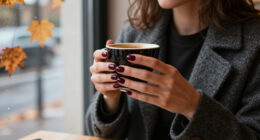 Anne Hathaway’s “Cherry Noir” Manicure Is Fall’s Moodiest Nail Trend